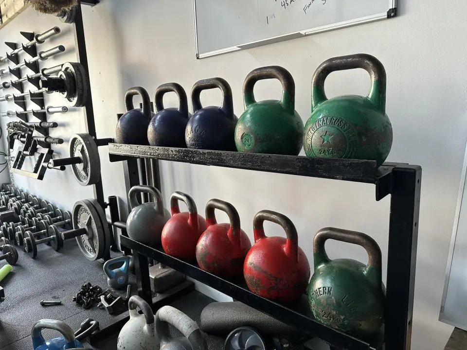 Kettlebell rack in the strength and conditioning area at Mission BJJ
